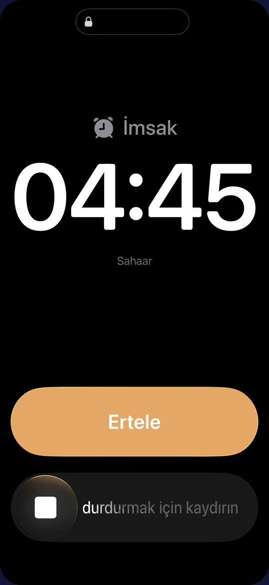 Tam ekran iPhone alarmı: İmsak 04:45, Ertele ve kaydırarak durdur.